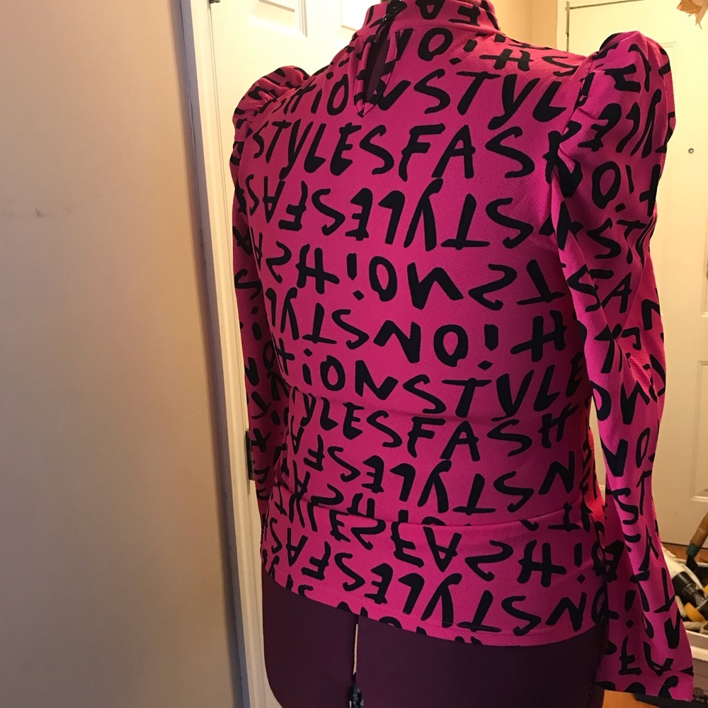 Funkadelic Shirt with ruffled shoulders.